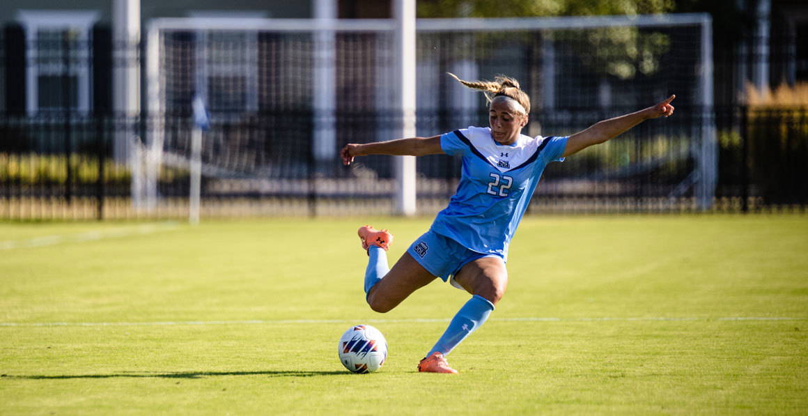 Womens Soccer Team Kicking