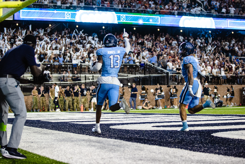 football player celebrating a touchdown