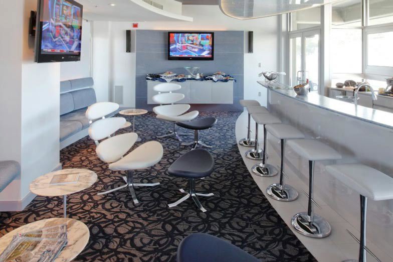 Decorated Room With Chairs And Tv